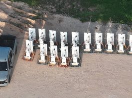 EV Charger Rollout Speeds Up Across America Thanks to Ironic Trump Era Policies Mysterious Stalls Wireless Tesla Robotaxi Chargers