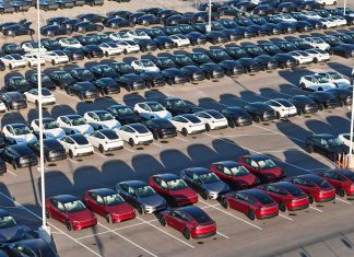 EV Sales Fall Back to 2022 Levels as Demand Drops After End of Tax Credit Tesla Ramps Up Production of Model Y Standard and Performance